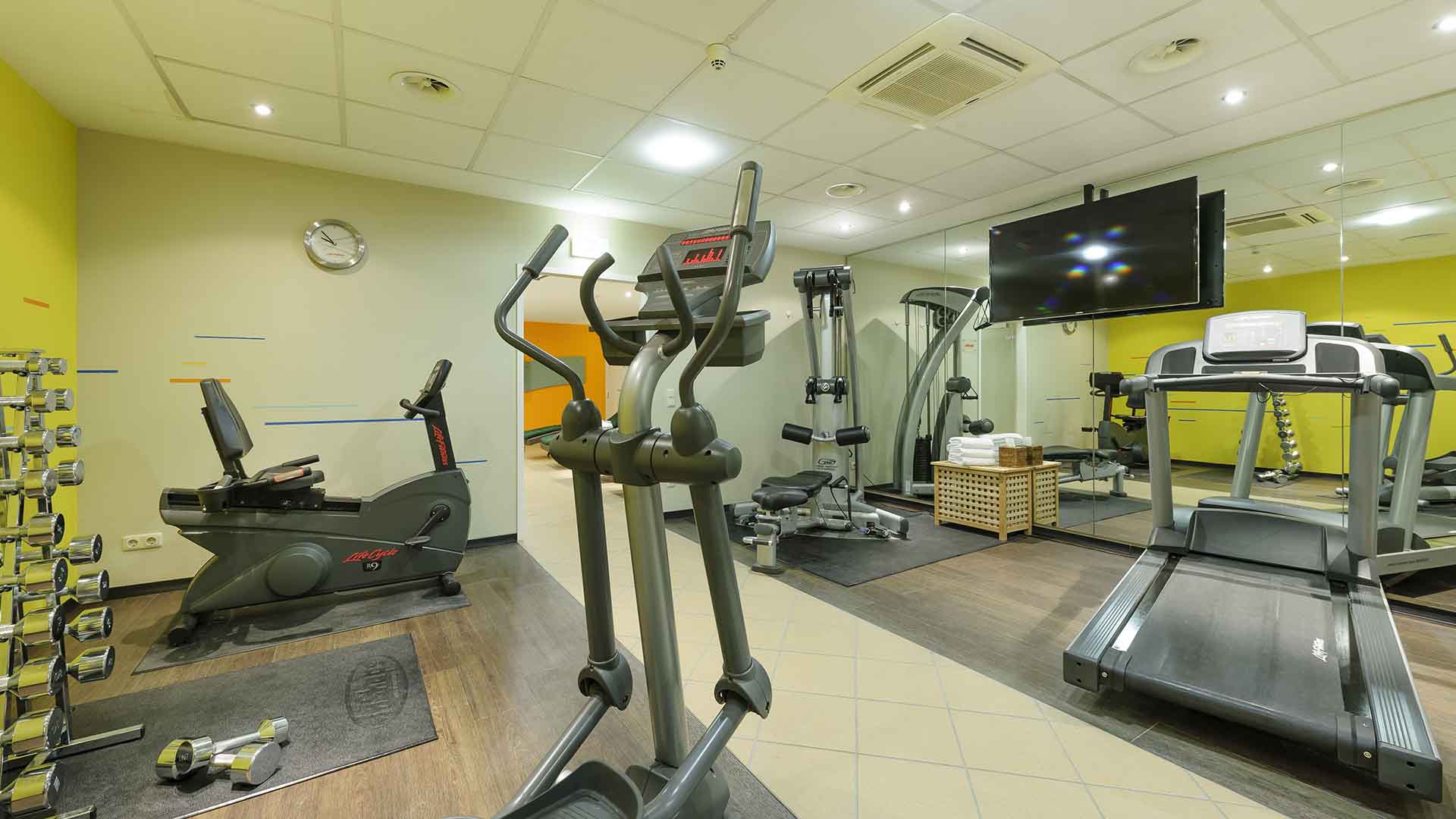 Modern fitness area with cardio and strength equipment