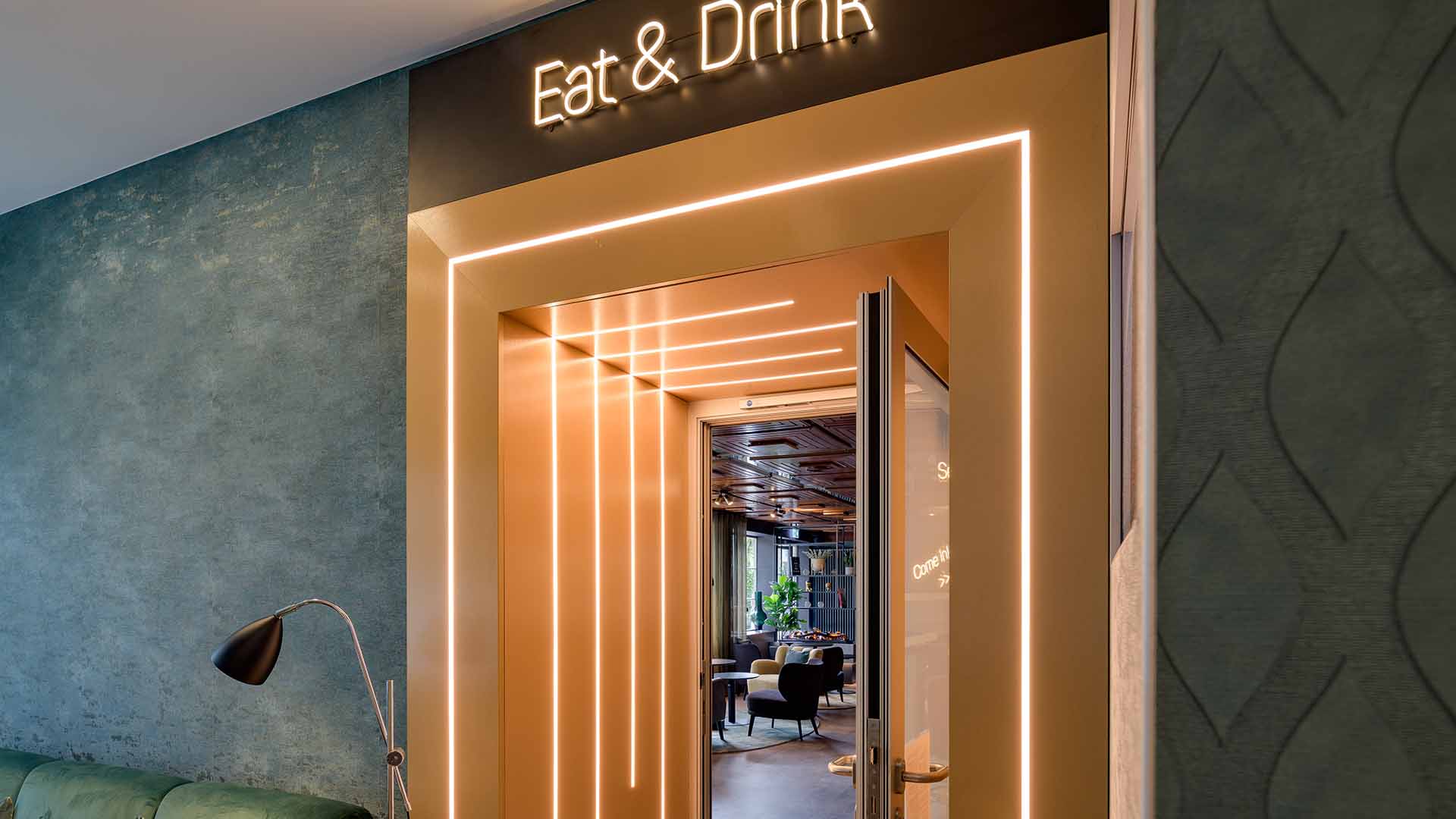 Eat & Drink · entrance with neon sign